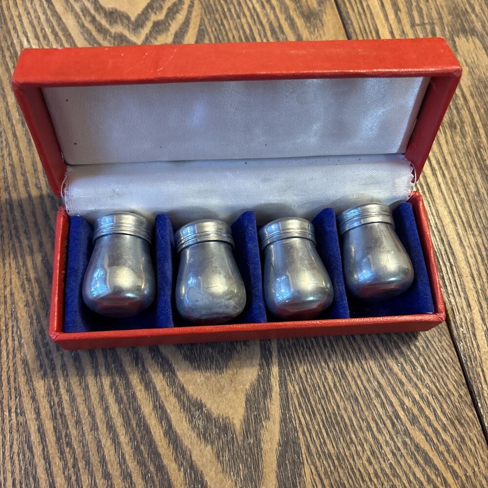 4 Salt and Pepper Shakers in Original Box pre owned silver colored